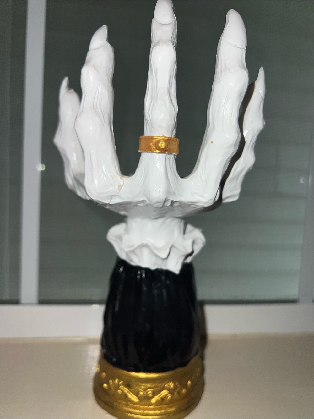 Source Unknown White and Gold Hand candle holder